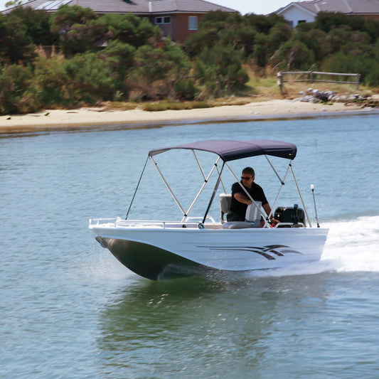 Boat on the water with a Bimini Top